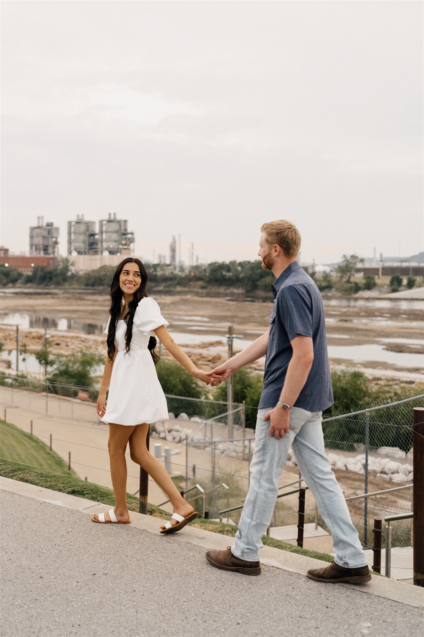 Engagement session at Gathering Place Tulsa with lush gardens and walking paths.