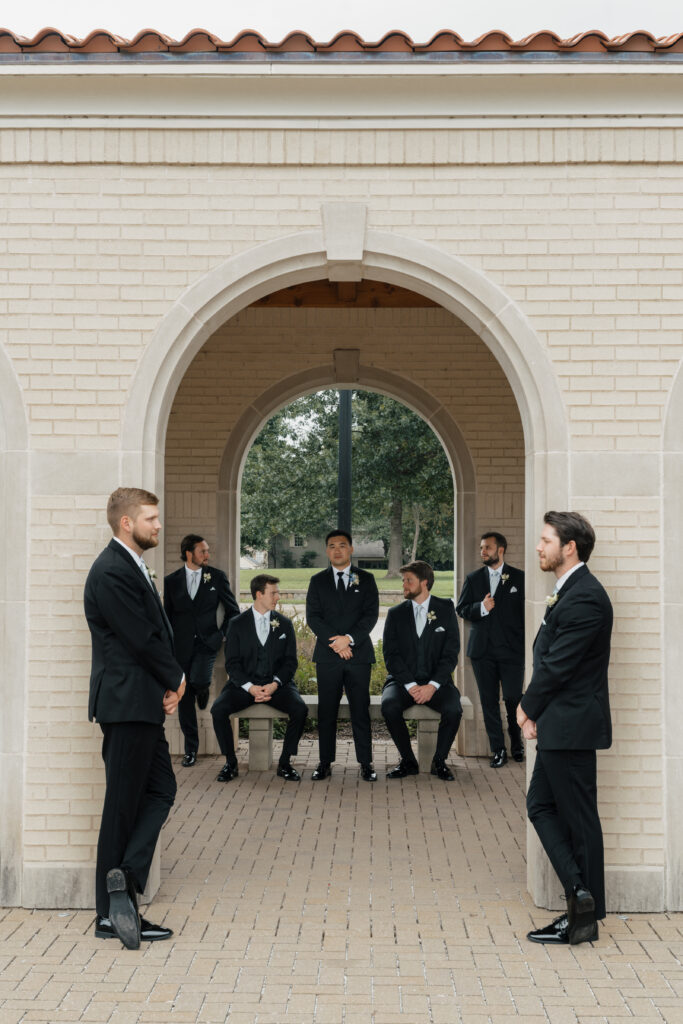 Groomsmen photos in front of The Mansion at Woodward Park