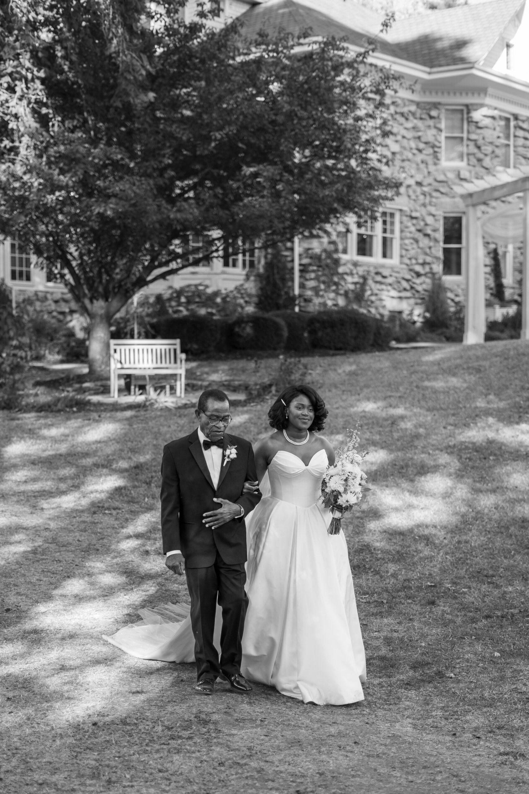 Bride and groom walk down aisle at Haseltine Estate