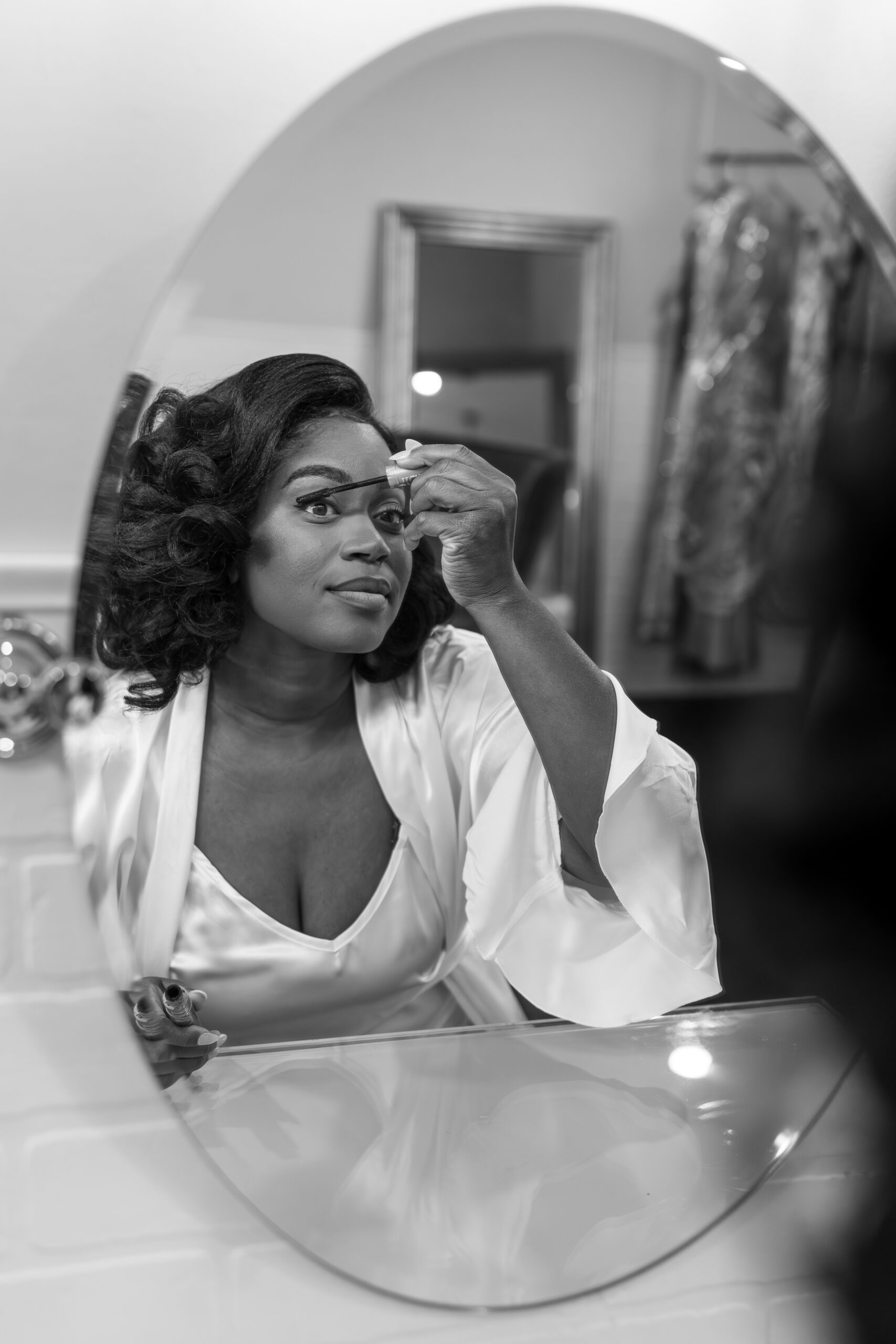 Bride getting ready in the bridal suite at Haseltine Estate wedding