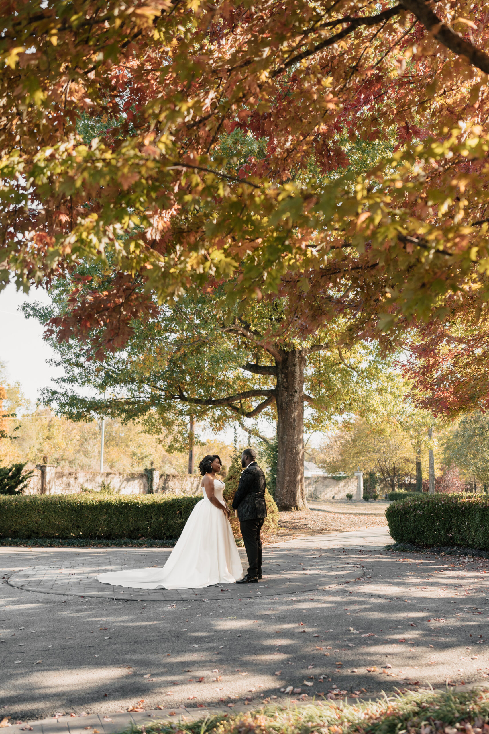 Romantic first look by ivy wall at Haseltine Estate