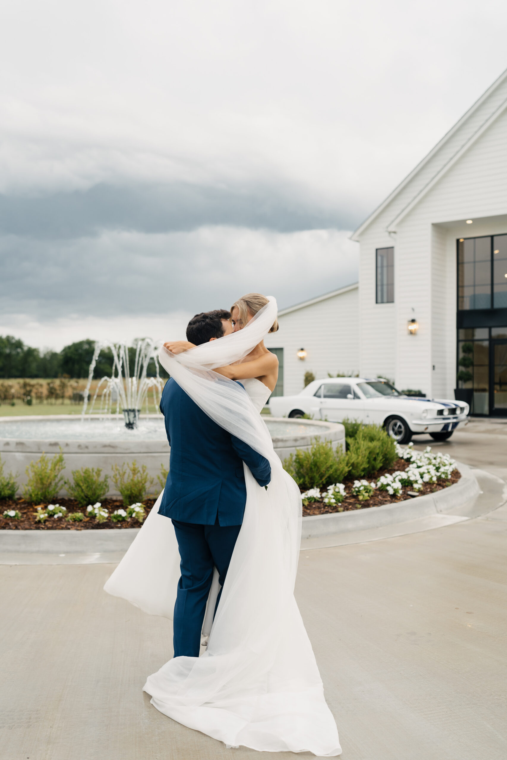 Couple portraits at Tulsa wedding with dramatic lighting