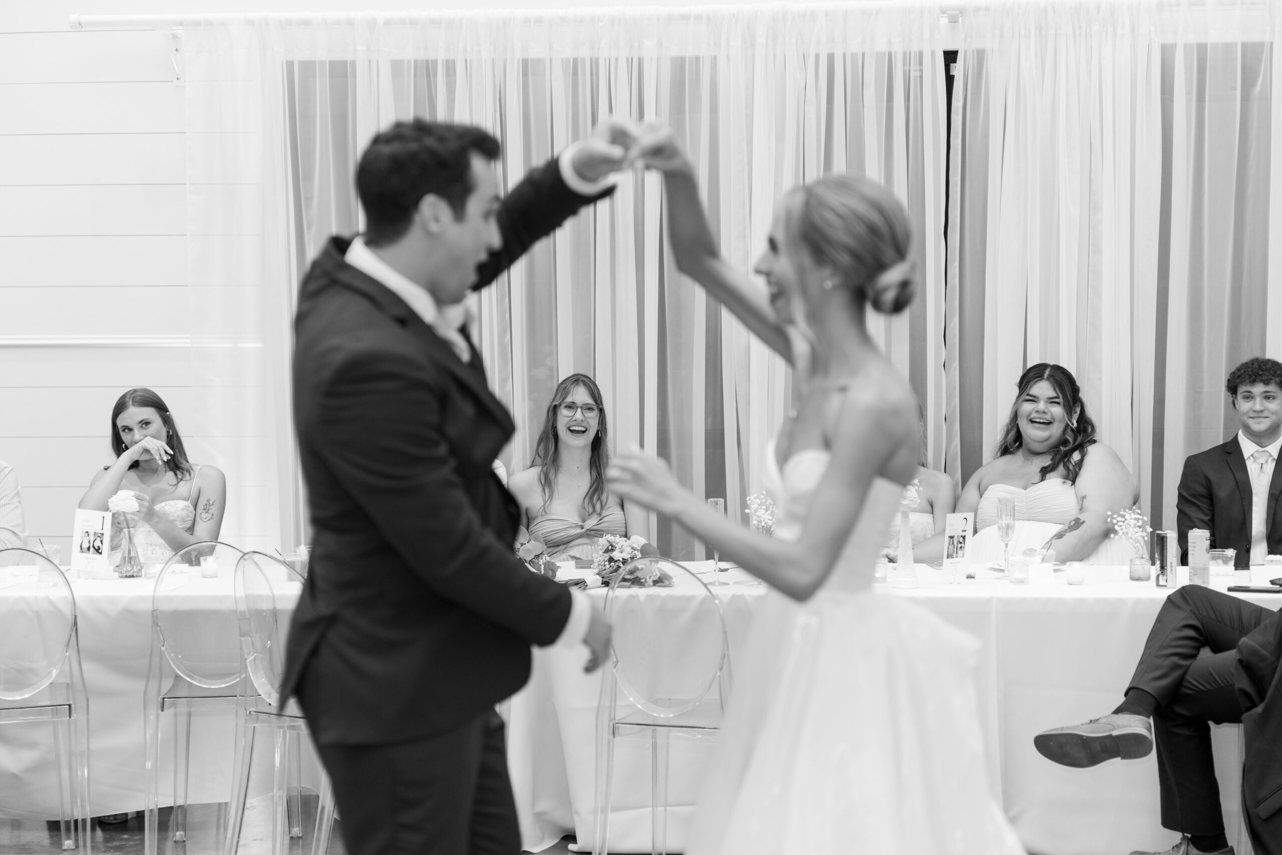 Wedding photography capturing joyful reception moments