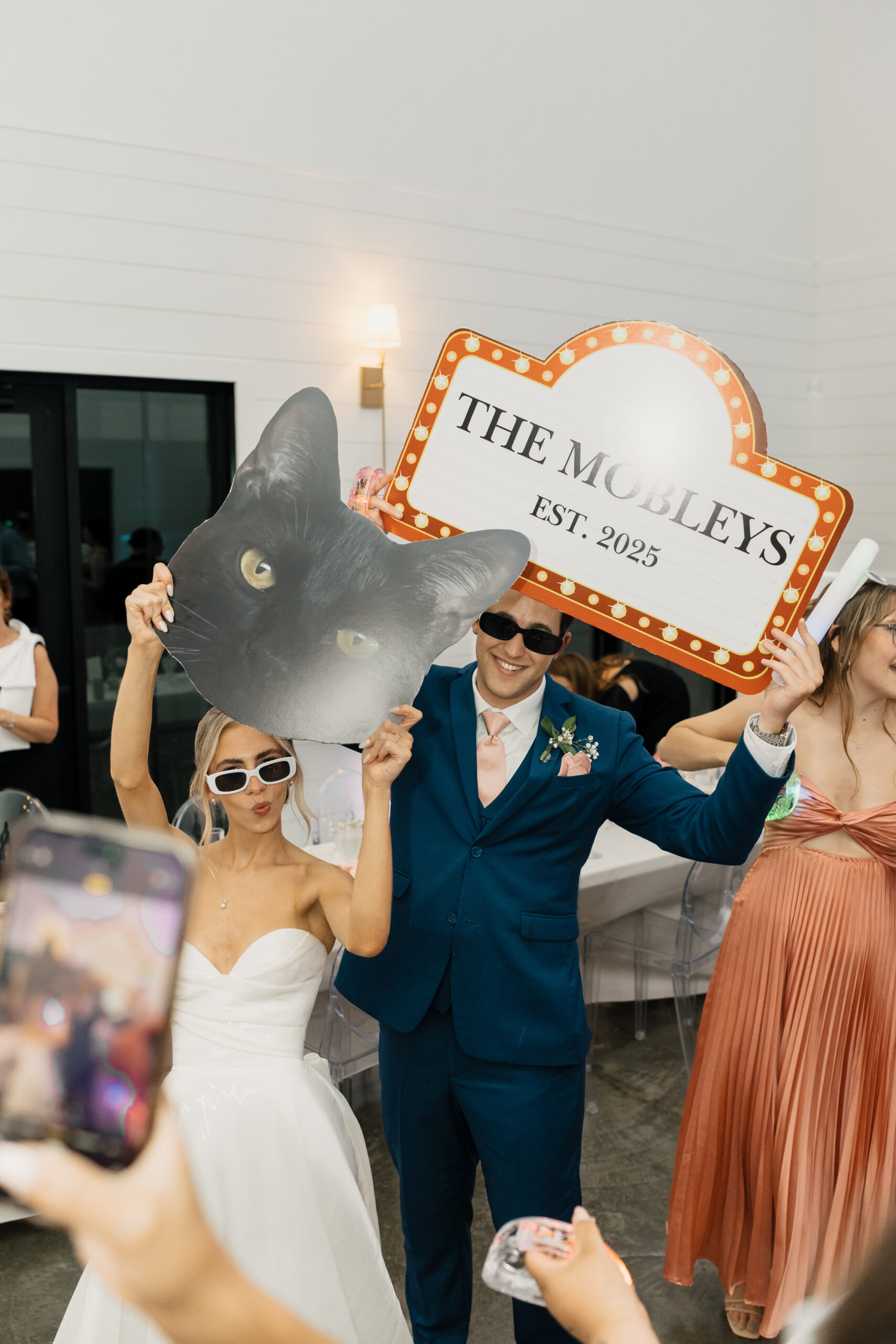 Bride and groom with cat 