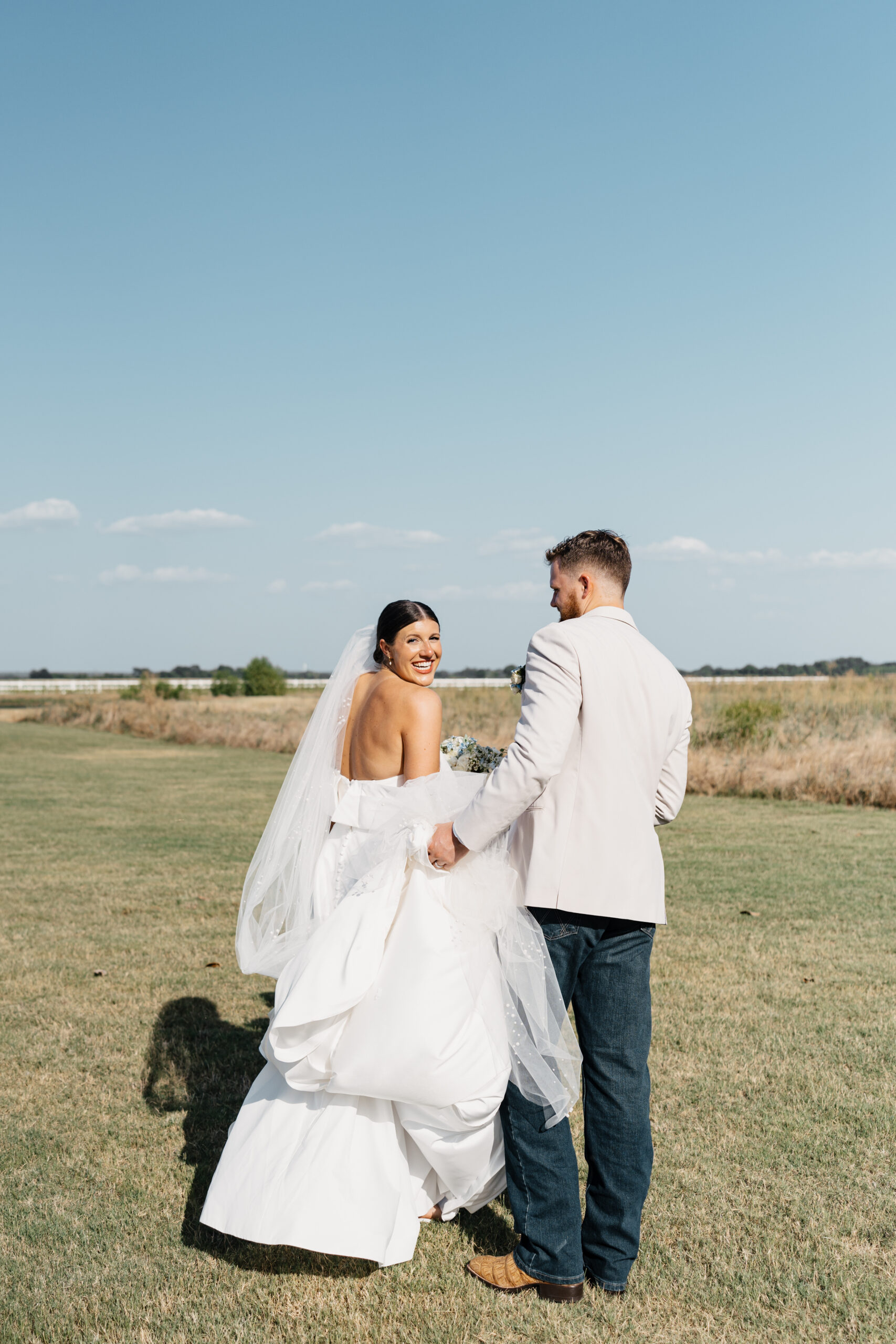 Lush green landscape surrounding The Gardenia, perfect for outdoor wedding portraits.