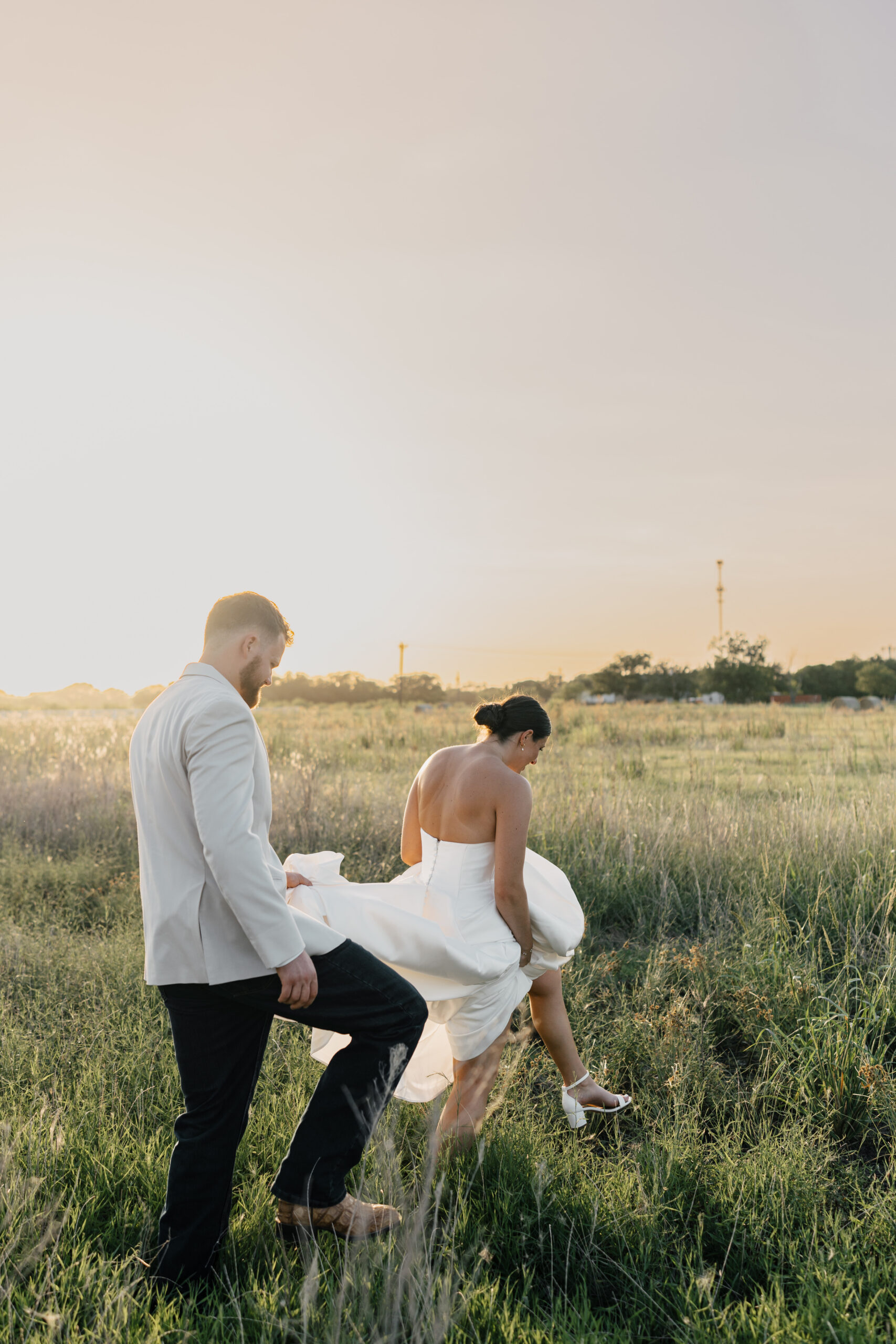 Sunset over The Gardenia in Texas, highlighting the venue’s open fields and romantic glow.