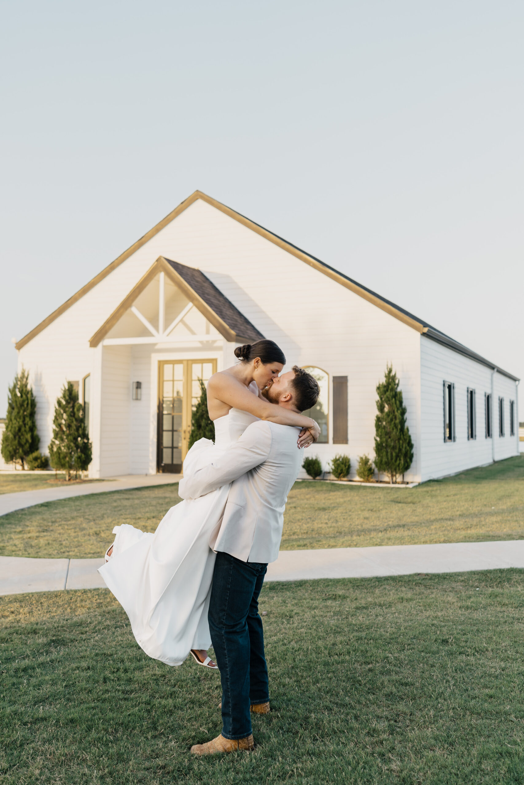 The Gardenia wedding venue in Valley View, Texas, featuring modern white architecture and open countryside views.