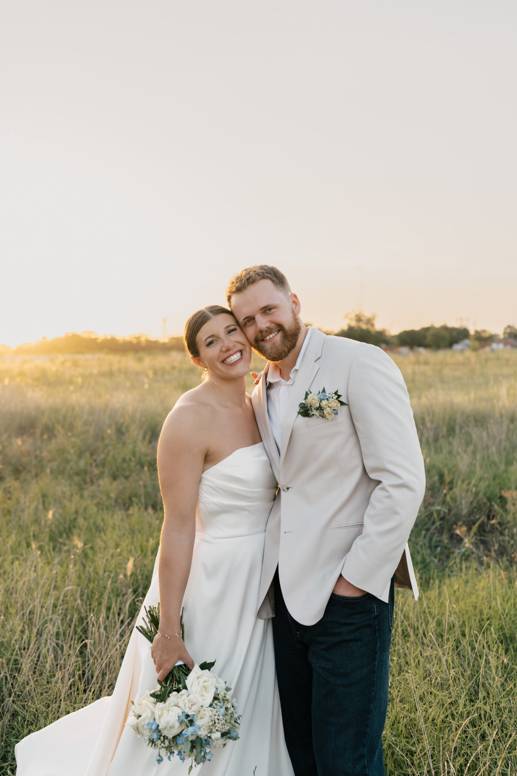 Bride and groom portraits taken at The Gardenia’s open field during golden hour.
