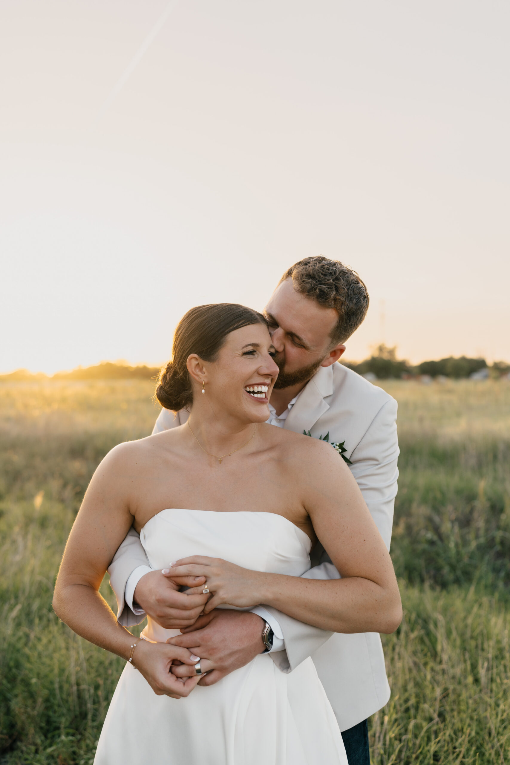 Bride and groom reviewing 12-month wedding planning checklist