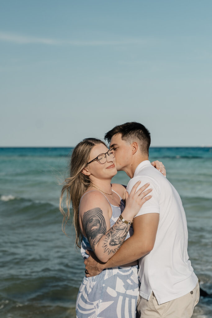 Destination couple enjoying beach sunset portraits