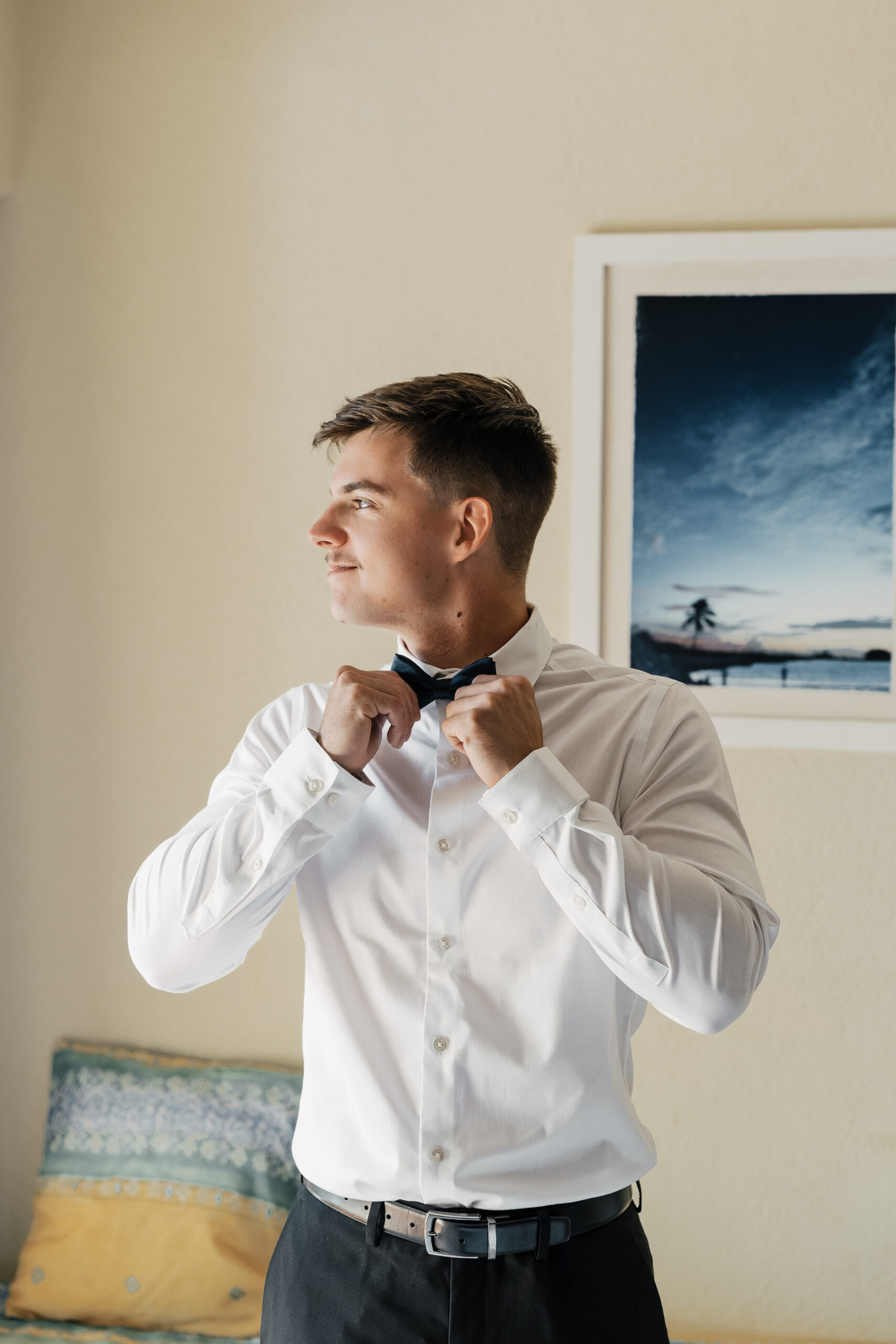 Groom getting ready for destination wedding in Mexico 