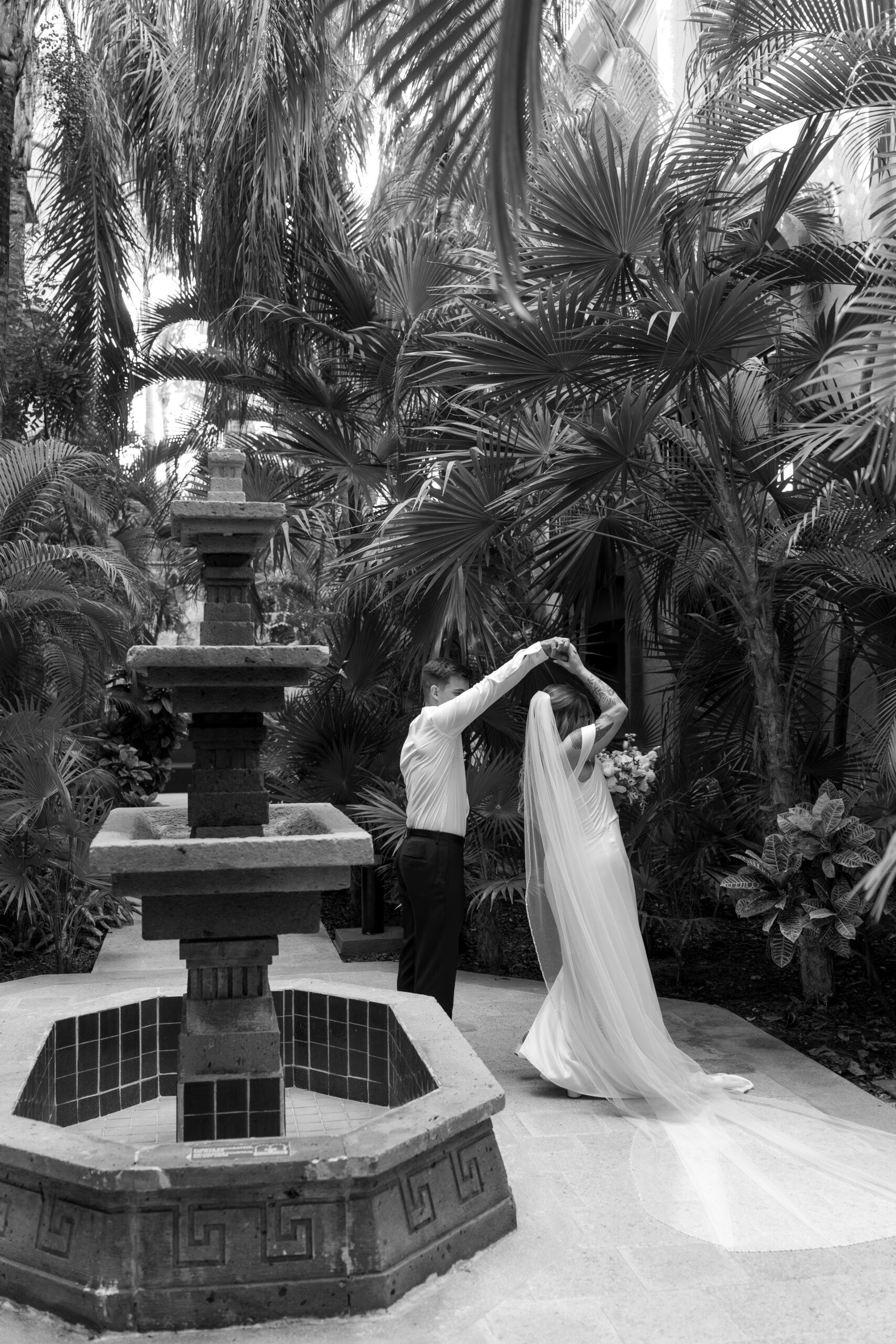 Bride twirling in her dress at Sandos Playacar Resort