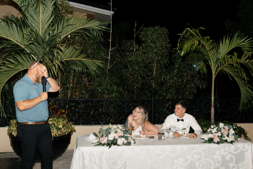 Candid laughter during wedding speeches
