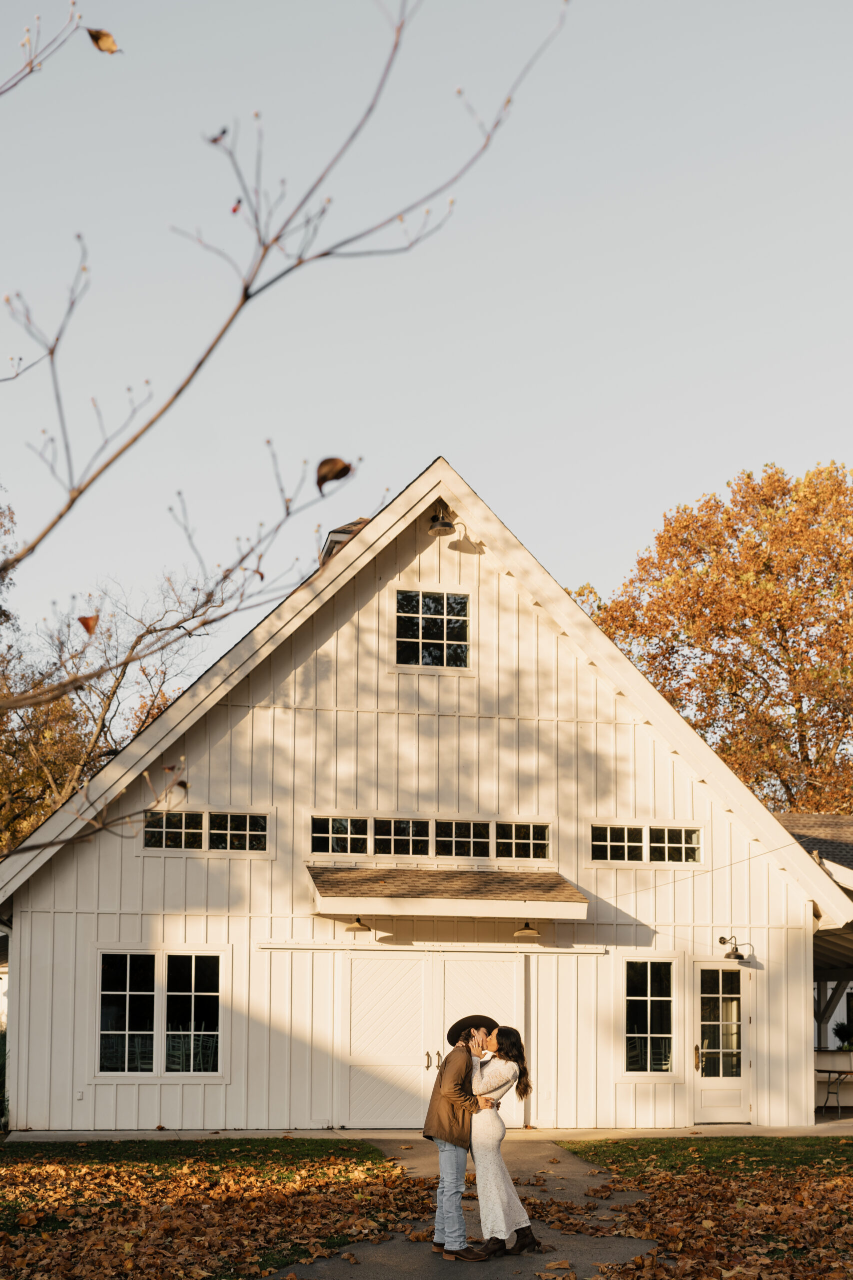 Country engagement session outfit inspiration: boots, hats, denim textures, and cozy fall tones
