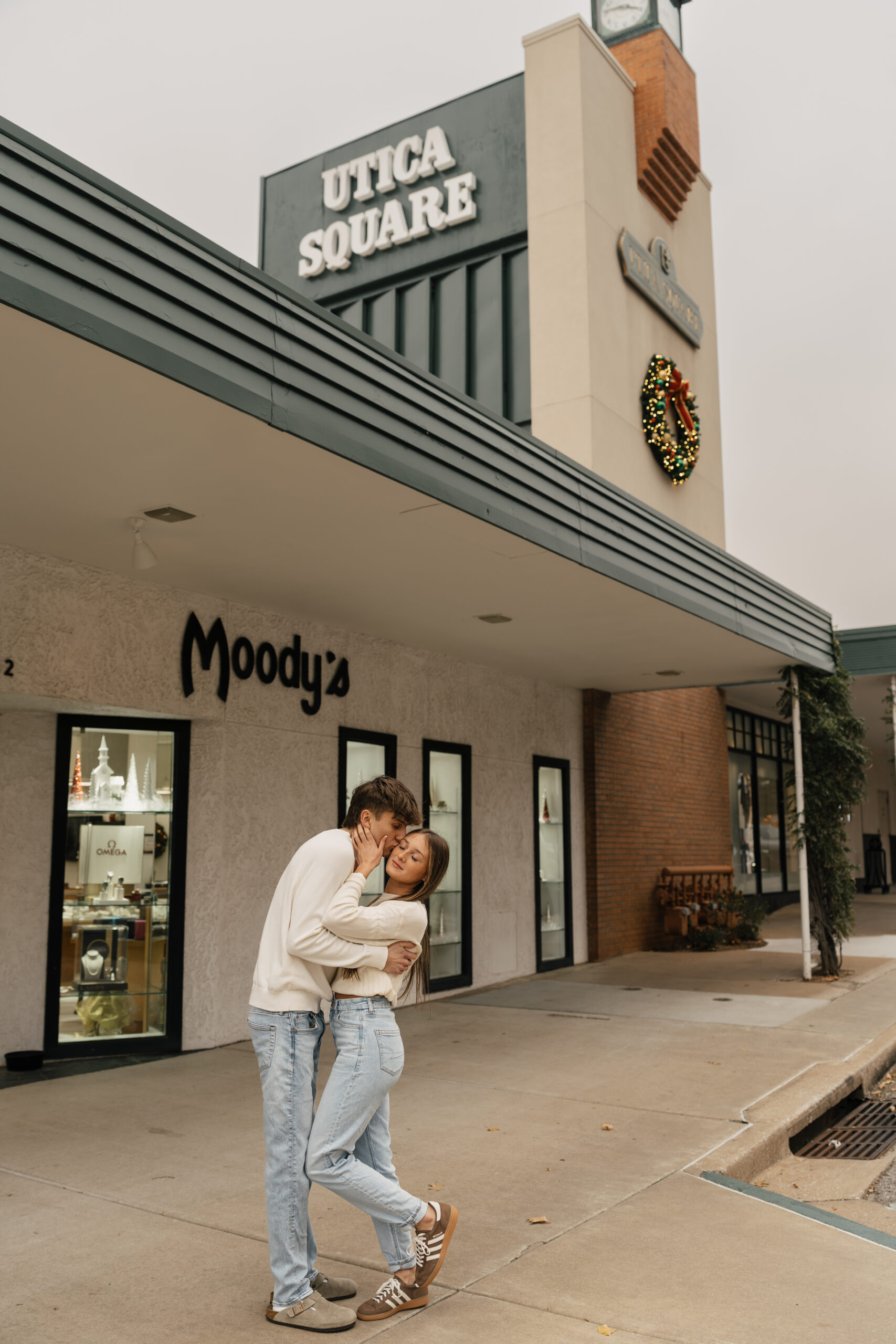 Couple in matching cozy sweaters at Utica Square